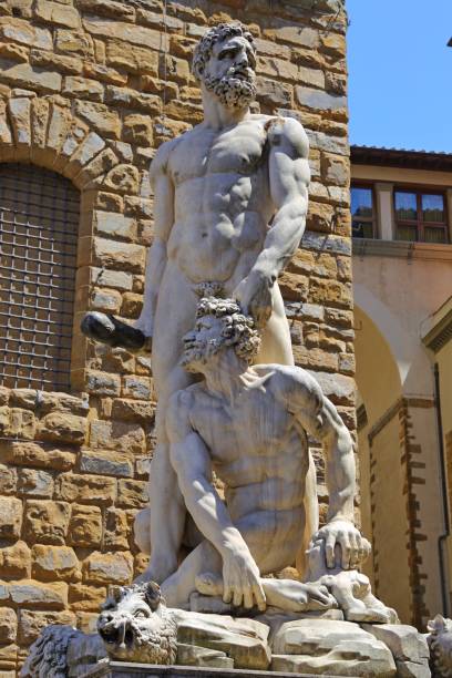 Hercules and Cacus Statue by Bandinelli Hercules and Cacus Statue by Bandinelli at Piazza della Signoria in Florence, Italy hercules florence italy muscular build statue stock pictures, royalty-free photos & images
