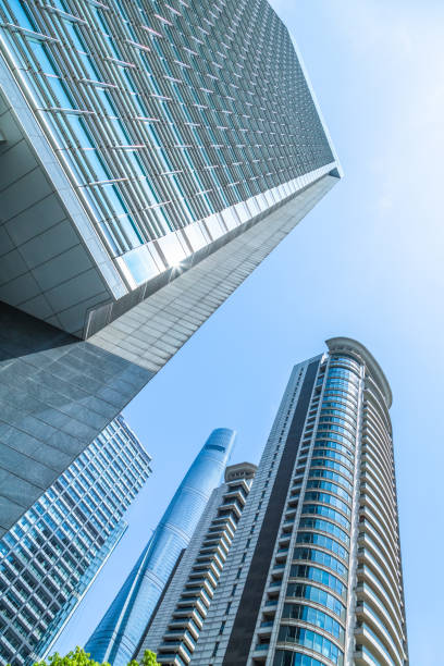 istock Low angle view of modern metallic skyscrapers 854826554