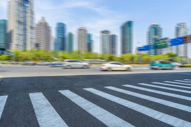 istock Clean asphalt road with city skyline background 854827738