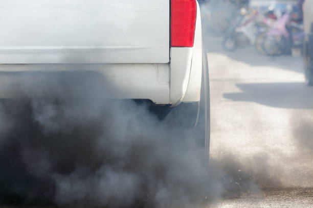 istock Air pollution from vehicle exhaust pipe on road 854833584