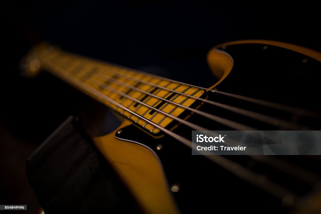 Bass Guitar Close up shot of a Bass guitar Bass Guitar Stock Photo