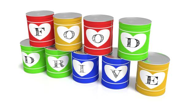 Nine stacked tin cans in different colors charity concept stock photo