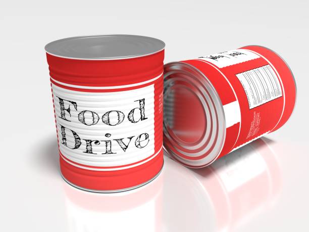 istock Two red cans on white with a label showing food drive 854860208