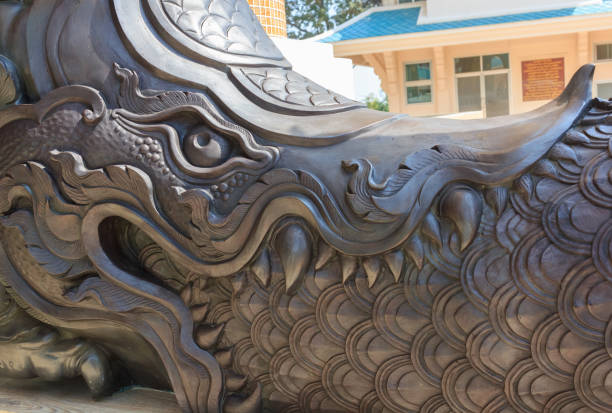 istock Serpent made of wood in Thai temple. 854867400