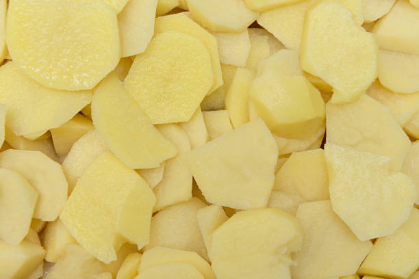 istock sliced potatoes ready for baking or frying 854899390