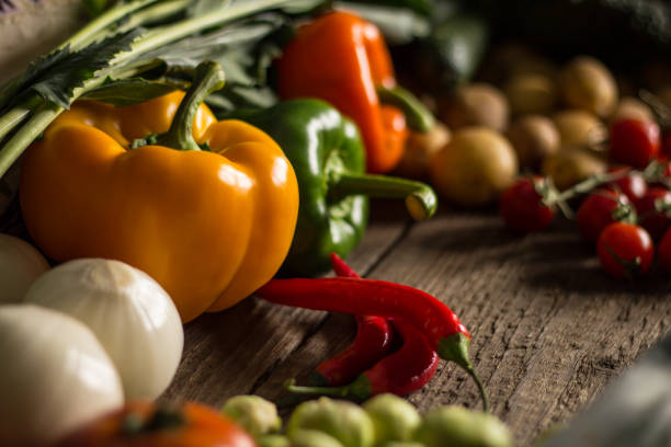istock Assortment of fresh homegrown vegetables. Rustic background 854902202