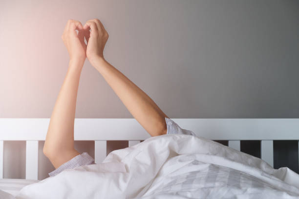 istock stretching your arm out of the blanket 854908834