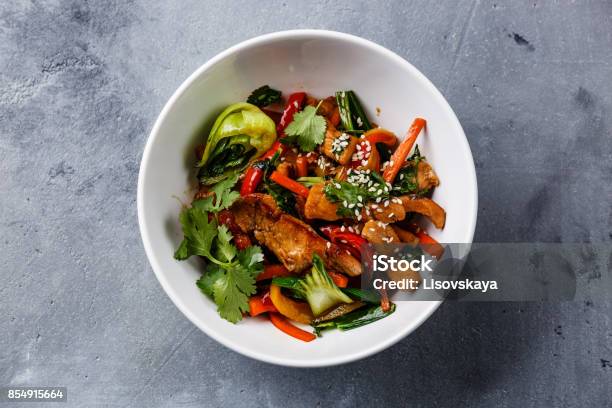 Chicken Meat With Vegetable In Bowl Stir Fry On Wok Stock Photo - Download Image Now