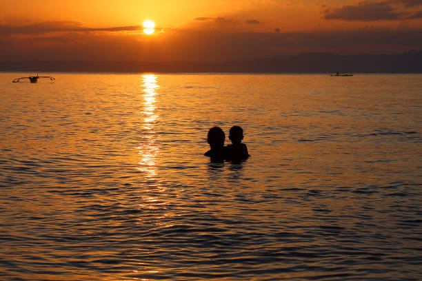 istock Mother and Child Bathing 854928160