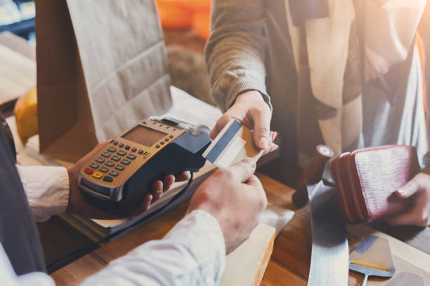 istock Customer paying for order of cheese in grocery shop. 854930838