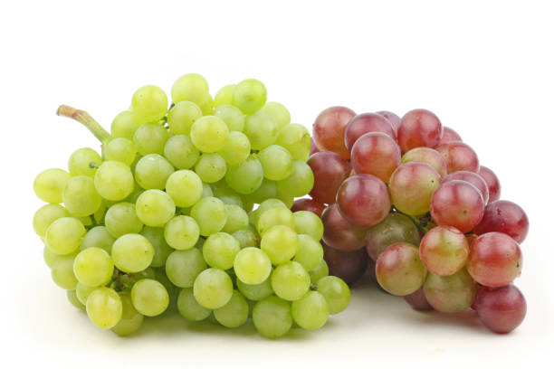 istock White and red grapes isolated on a white background 854931288