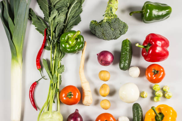 big choice of fresh fruits and vegetables on market counter