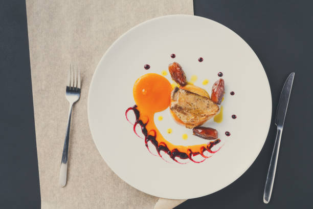 istock Roasted goose liver with date fruit and apple 854932932