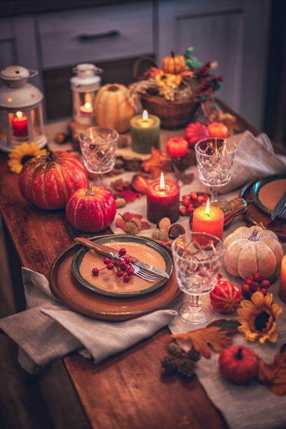 istock Decorated Table for Thanksgiving Dinner with Candles, Pumpkins, Leafs and Nuts 854938254