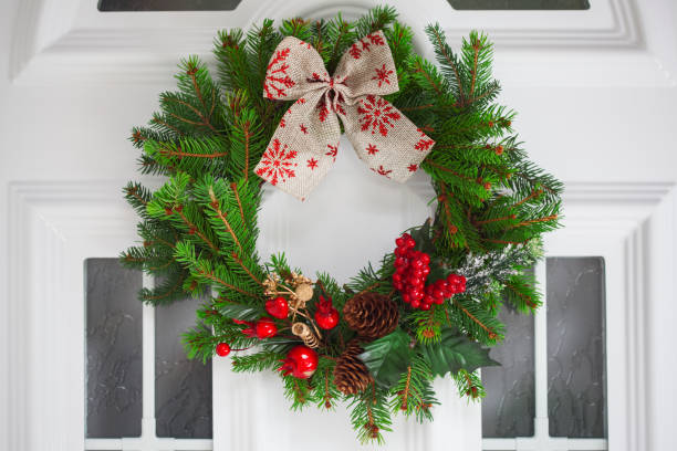 istock Christmas wreath on a  door 854938280