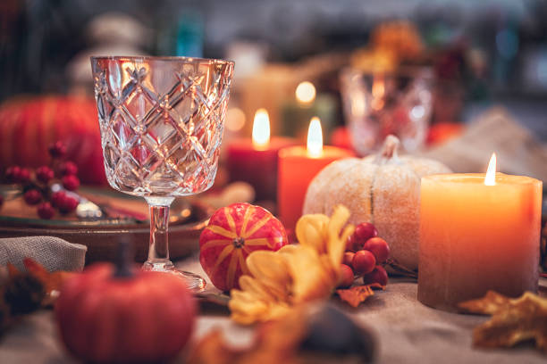 istock Decorated Table for Thanksgiving Dinner with Candles, Pumpkins, Leafs and Nuts 854938296