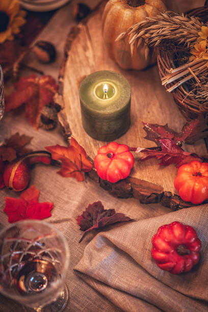 istock Decorated Table for Thanksgiving Dinner with Candles, Pumpkins, Leafs and Nuts 854938302