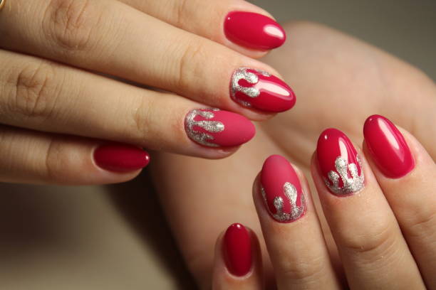 istock Youth manicure design, red and silver 854950582