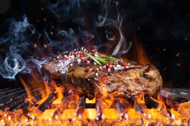 istock Delicious grilled beef steak on a barbecue grill 854961478