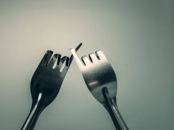 istock Fork hook each other promise, peace, friendship background concept. 854964542