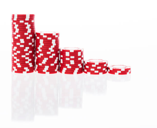 istock Stacks of red poker chips in a row 854965508
