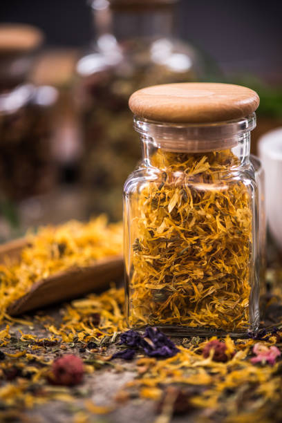 istock Tea with dried flowers and fruits in jar 854966068
