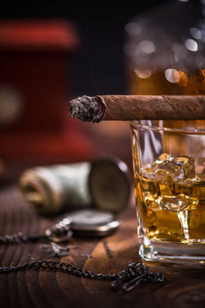 istock Cuban cigar and cognac over ice cubes 854968468