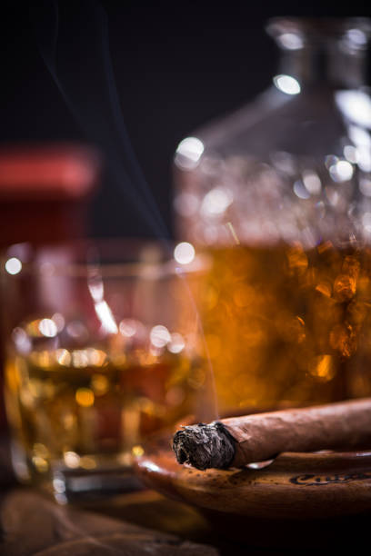 istock Cuban cigar and expensive alcohol in carafe 854968562