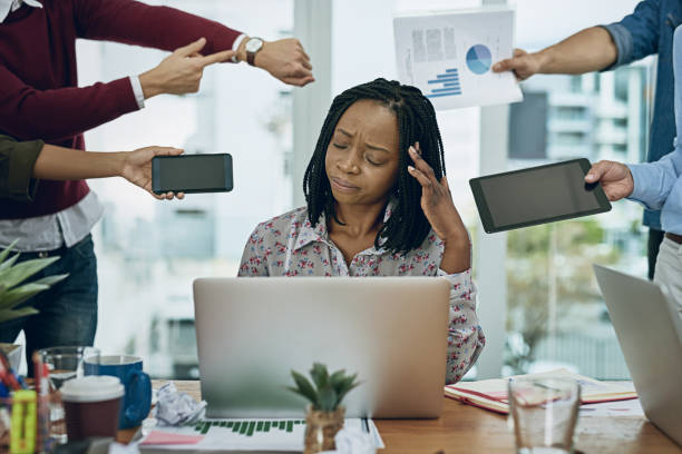 istock Drowning in the demands of the workday 854972466