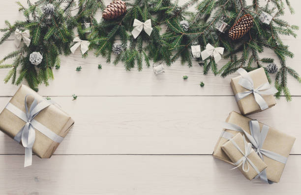 istock Christmas decoration, gift boxes and garland frame background 854981240