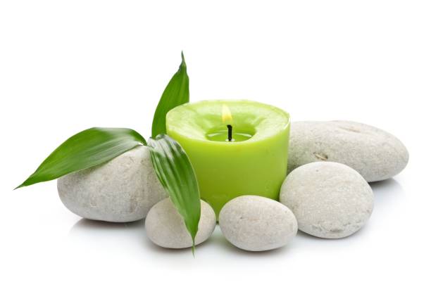 istock bamboo, candle, spa stones on a white background 854981834