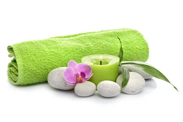 istock bamboo, candle, Orchid, towel, Spa stones on white background 854981856