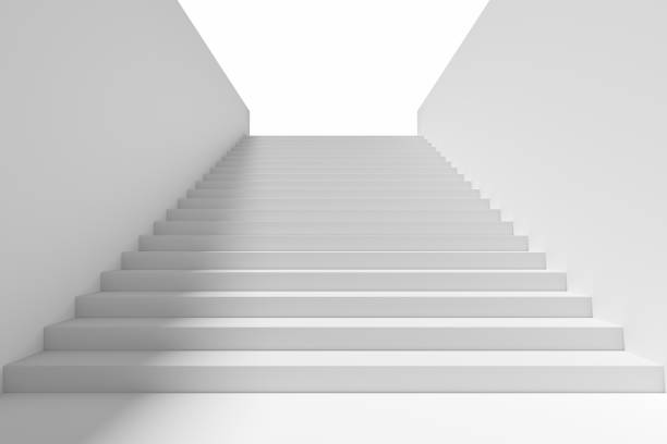 istock Long staircase in underground passage upward with shadow 854985388