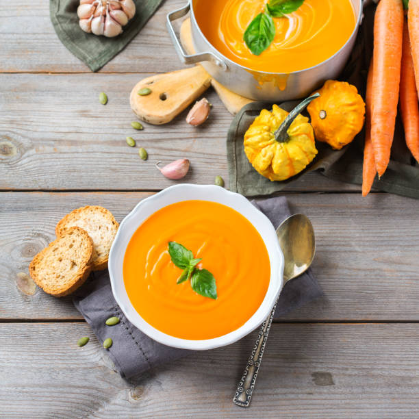 istock Fall autumn roasted orange pumpkin carrot soup with garlic 854989154