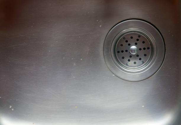 istock Food waste left in a sink. Closeup. 854996084