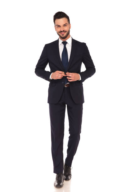 istock happy young business man closing his suit and smile 855004264
