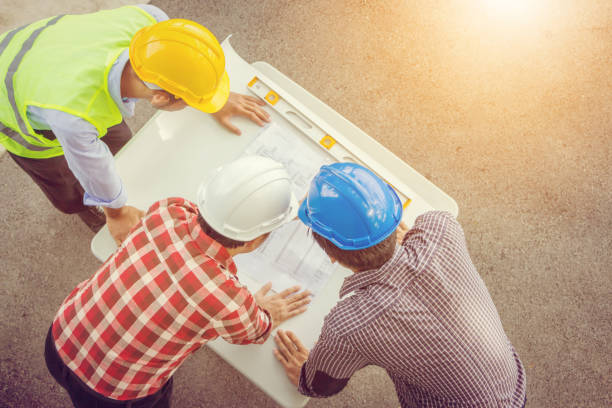 istock Group of engineer man team meeting at construction site, Success business teamwork concept 855004274