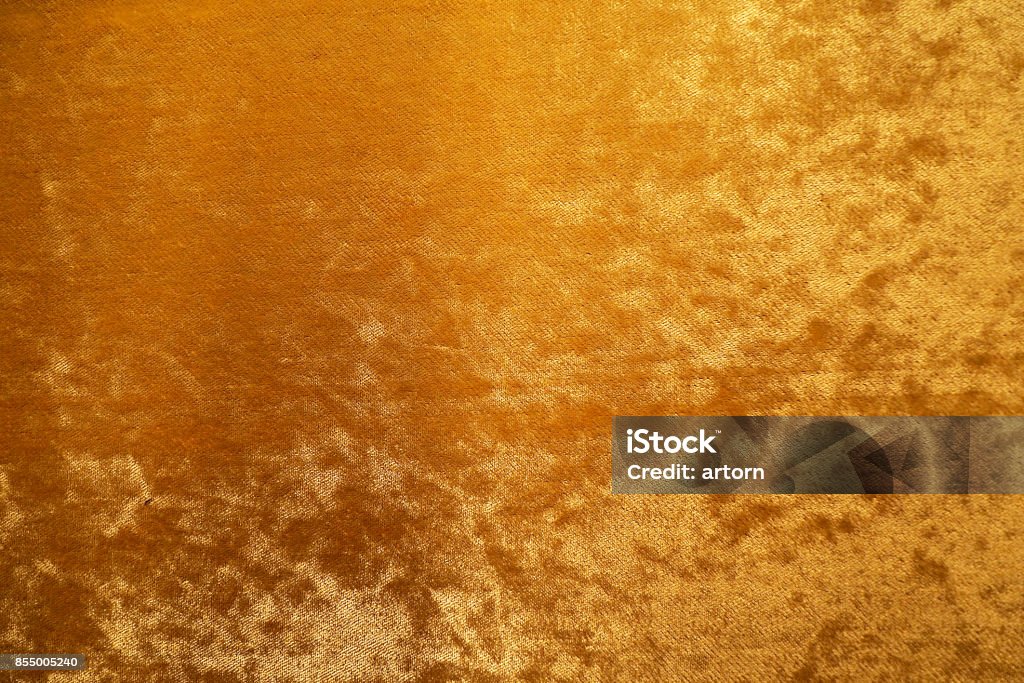 Gold colour velvet fabric background texture Velvet Stock Photo