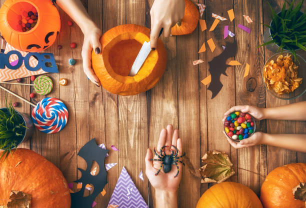 istock family preparing for Halloween. 855008138