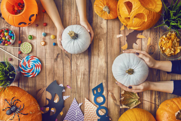 istock family preparing for Halloween. 855008172
