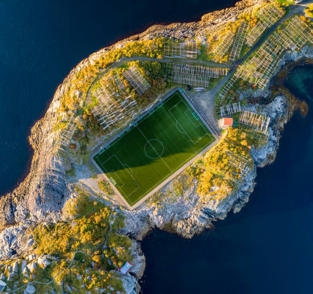 Football field in Henningsvaer from above Football field in Henningsvaer from above. Henningsvaer is a fishing village located on several small islands in the Lofoten archipelago in Norway lofoten and vesteral islands photos stock pictures, royalty-free photos & images