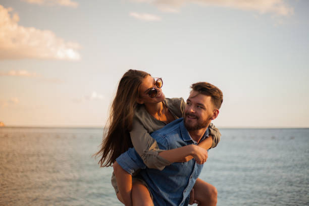 istock Piggybacks is the best idea to do on the beach 855018934