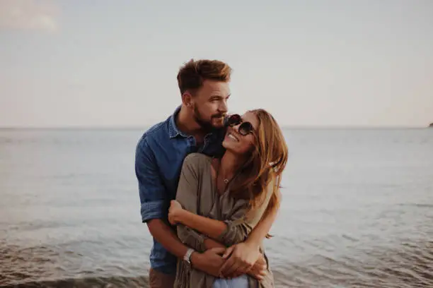 Photo of Girlfriend feeling safe in her boyfriends arms