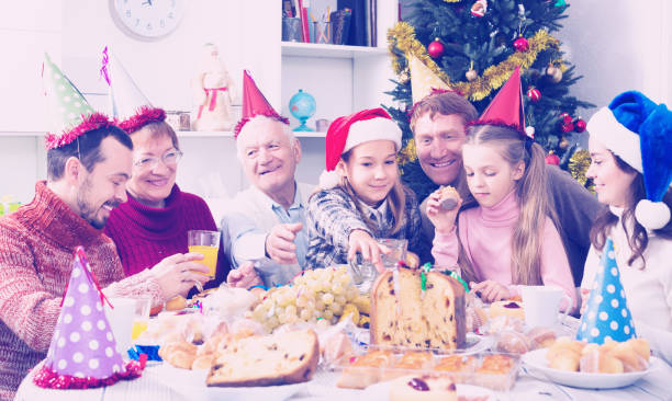 istock Family enjoying Christmas dinner 855027224