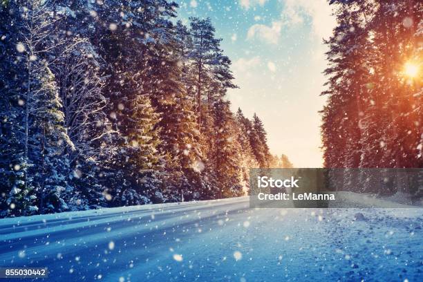 Car Tires On Winter Road Stock Photo - Download Image Now - Christmas, Car, Winter