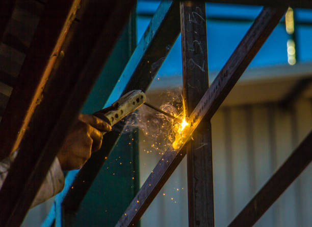 istock Industrial welder in a small factory 855053060