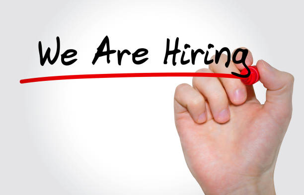 istock Hand writing inscription We Are Hiring with marker, concept 855054598