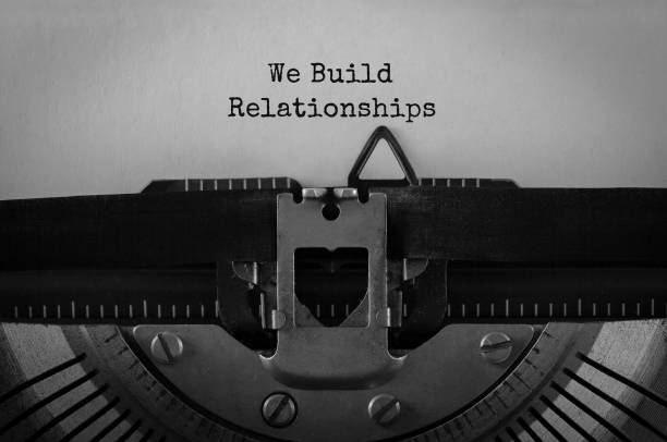 istock Text We Build Relationships typed on retro typewriter 855054638
