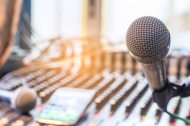 istock The microphone on the audio mixer. In the recording studio. 855060348