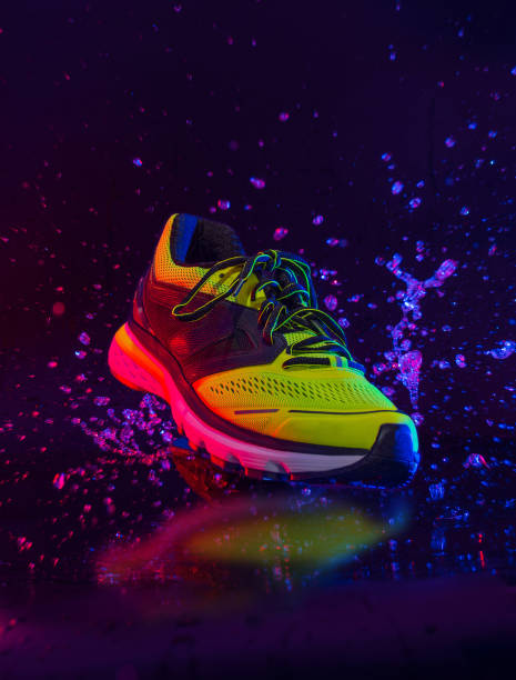 sports footwear on a black background stock photo